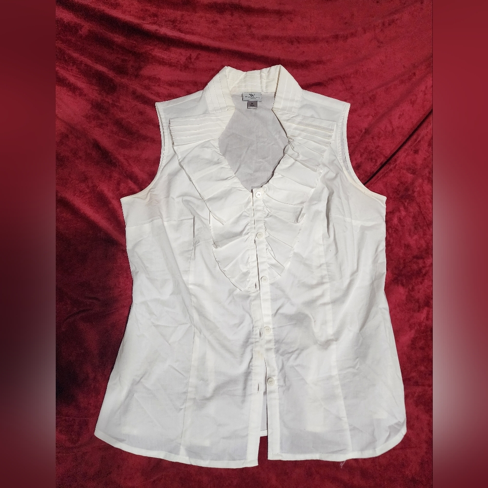 Sleeveless white summer blouse